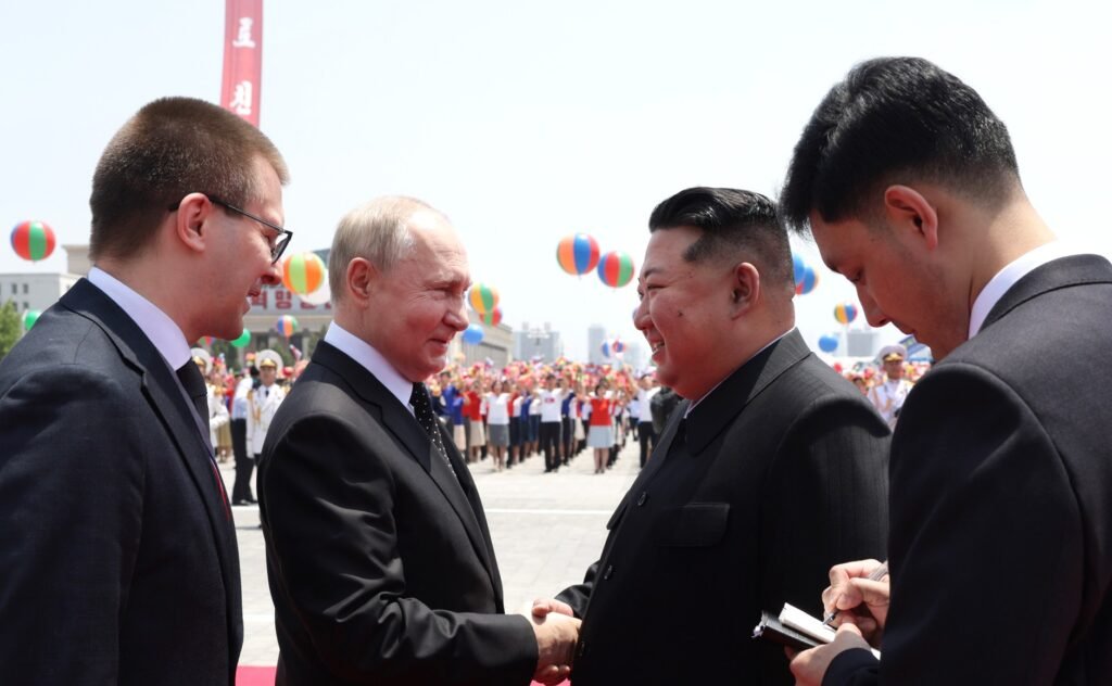 Vladimir Putin and Kim Jong-un